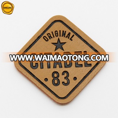 Sinicline customized die-cut black logo engraved brown PU jeans leather patches