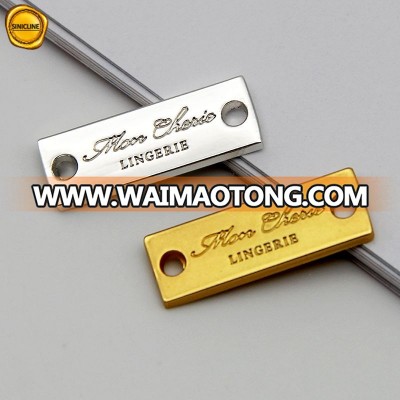 Sinicline customized debossed metal logo labels for sewing